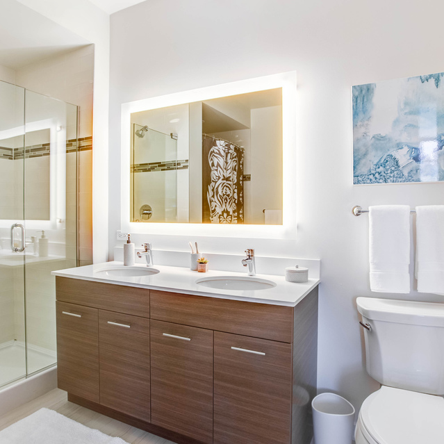 Next Apartments - Bathroom with a Sink, Toilet, and Shower