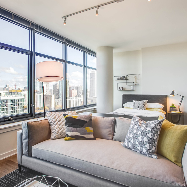 Next Apartments - Living Room with City View